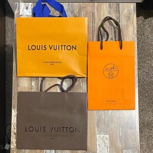 Louis Vuitton Orange and Brown Shopping Bags + one Hermes Shopping Bags